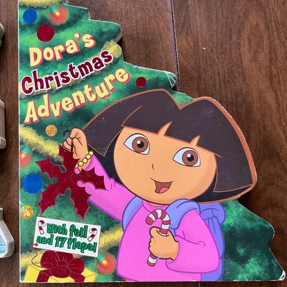 Two books: Dora’s Christmas Adventure and The Little Engine that could - Picture 2 of 4